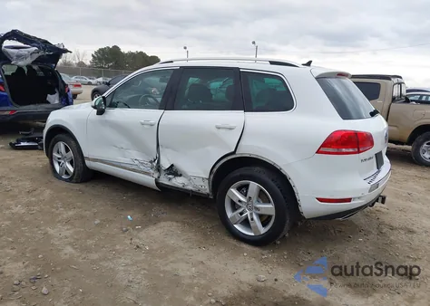 2014 Volkswagen Touareg Tdi Lux z USA, uszkodzony, nr VIN WVGEP9BP0ED009194
